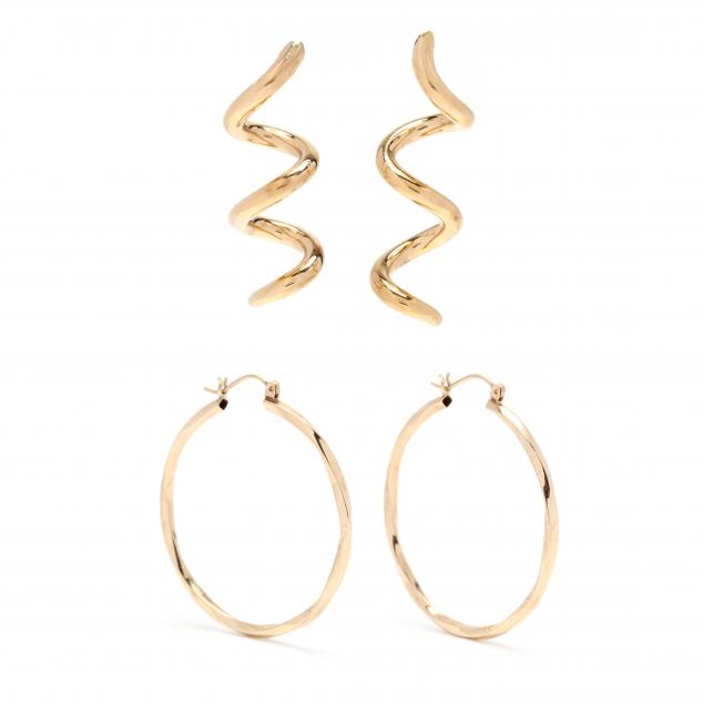 two-pairs-of-gold-earrings