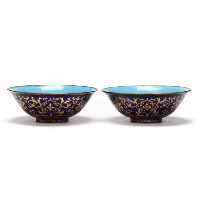 a-pair-of-gilt-decorated-blue-ground-painted-enamel-bowls