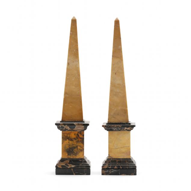 pair-of-carved-marble-obelisks-on-plinths