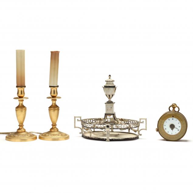 a-grouping-of-neoclassical-style-table-accessories