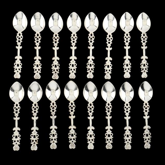 a-set-of-sixteen-sterling-silver-spoons