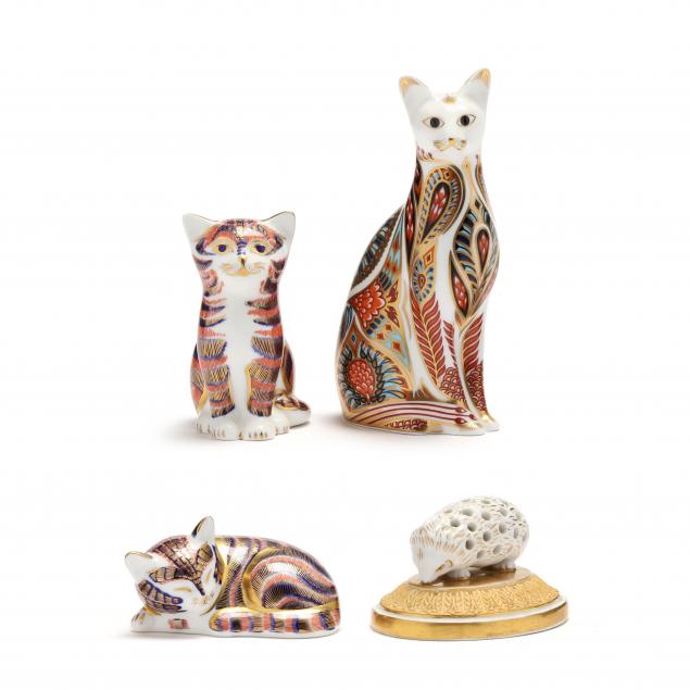 three-royal-crown-derby-porcelain-cats-and-kpm-hedgehog