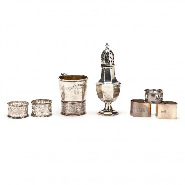 a-grouping-of-seven-english-silver-tableware-articles