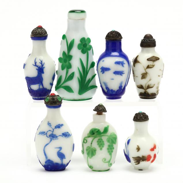 a-group-of-seven-chinese-peking-glass-snuff-bottles