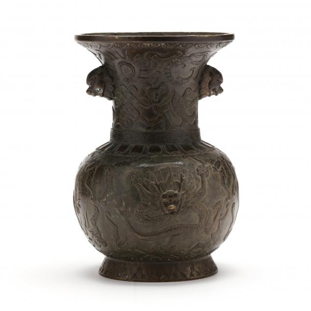 a-chinese-bronze-vase-with-frontal-facing-dragon