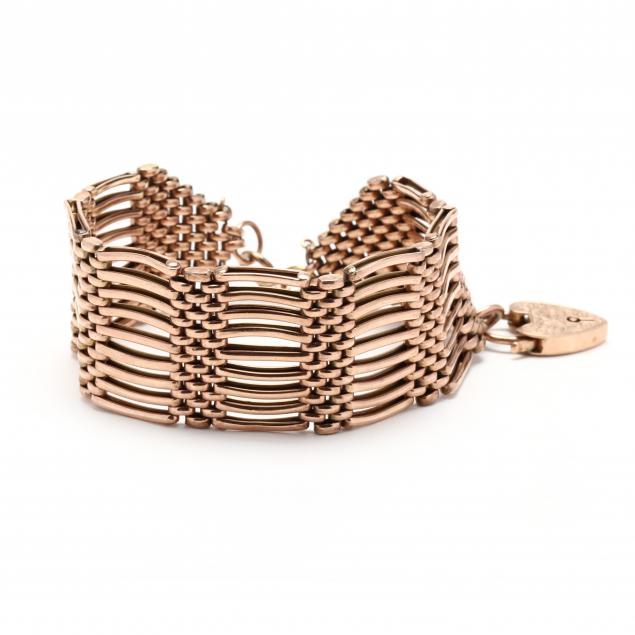 vintage-rose-gold-gate-link-bracelet-with-gold-padlock-charm