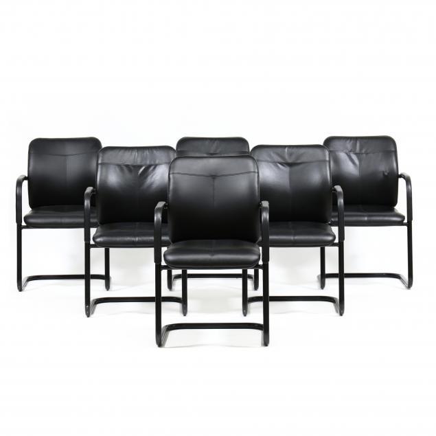 six-post-modern-leather-armchairs