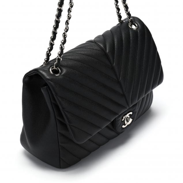 Chanel Black Chevron Quilted Lambskin Leather Medium Classic Flap Shoulder  Bag Chanel | The Luxury Closet