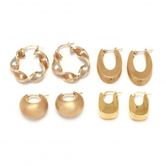 four-pairs-of-gold-hoop-earrings