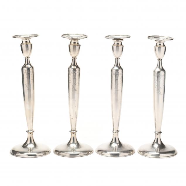 four-american-sterling-silver-candlesticks