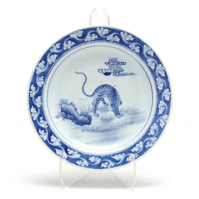a-japanese-blue-and-white-porcelain-dish-with-tiger