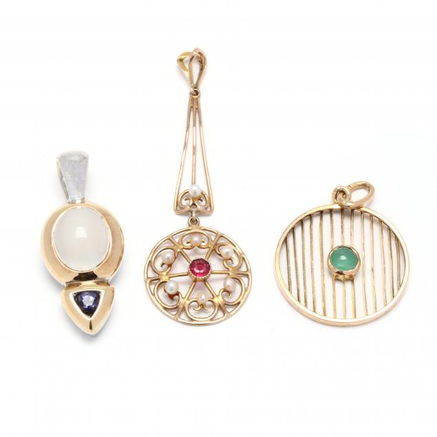 three-gold-and-gem-set-pendants