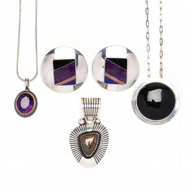 group-of-silver-and-gem-set-jewelry-items
