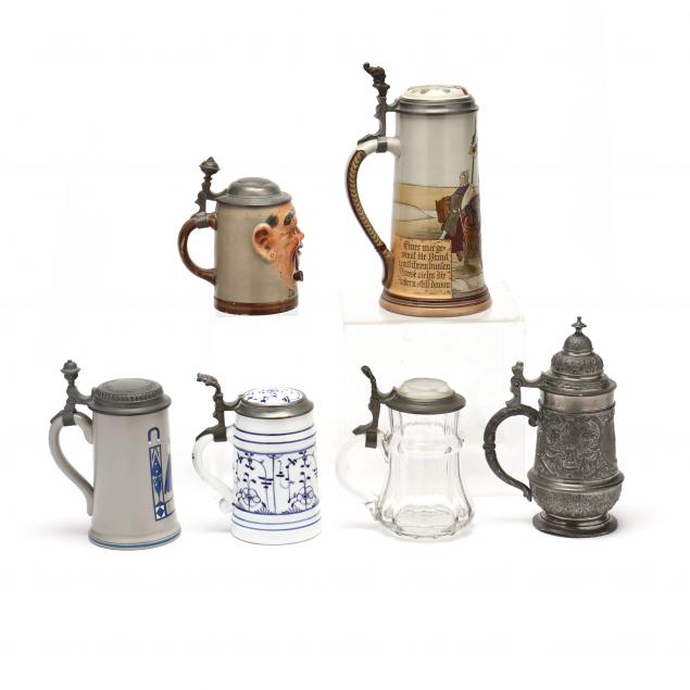 a-grouping-of-six-german-steins