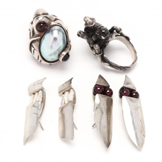 four-silver-jewelry-items