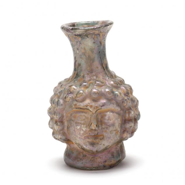 roman-style-glass-jar-with-janiform-features