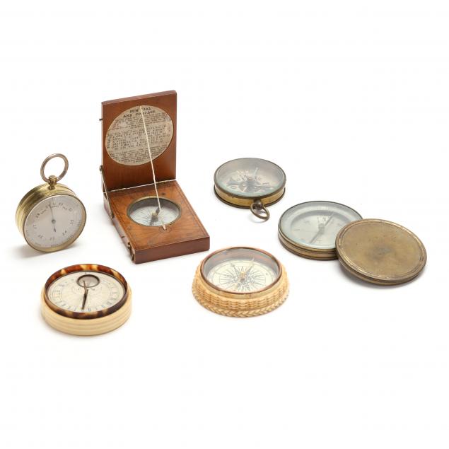 a-selection-of-six-pocket-compasses-instruments