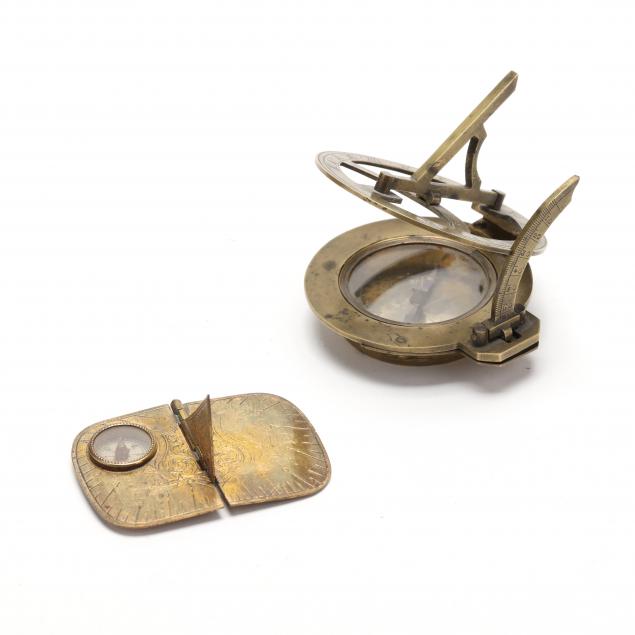 two-antique-brass-compass-sundial-instruments