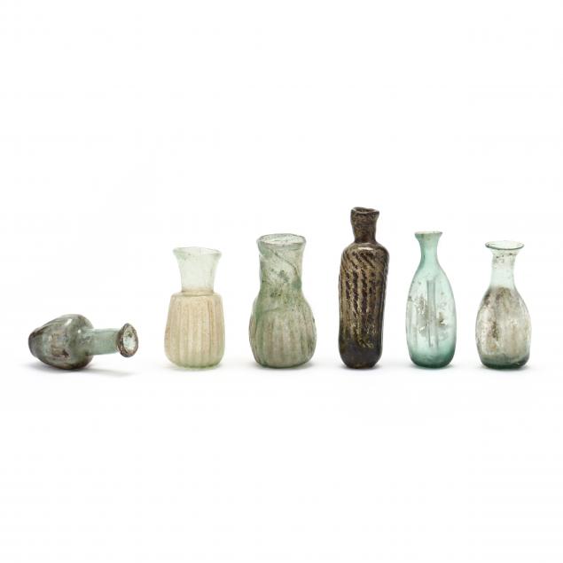 six-small-fluted-roman-style-glass-bottles