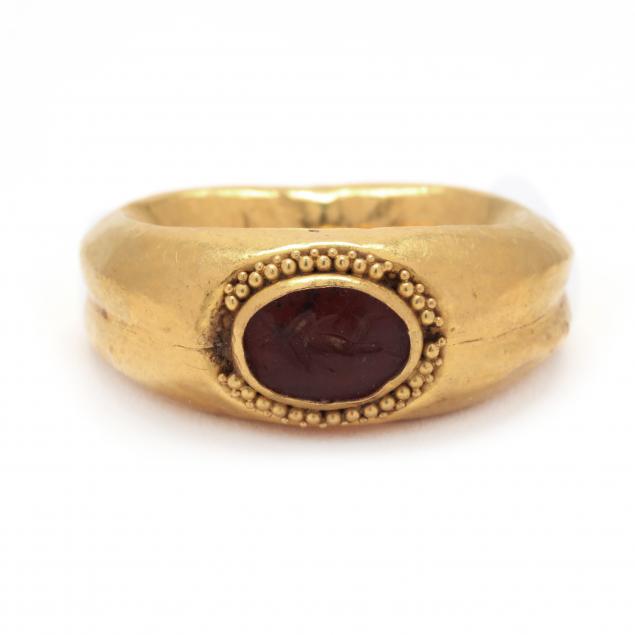 classical-style-gold-ring-with-intaglio-satyr