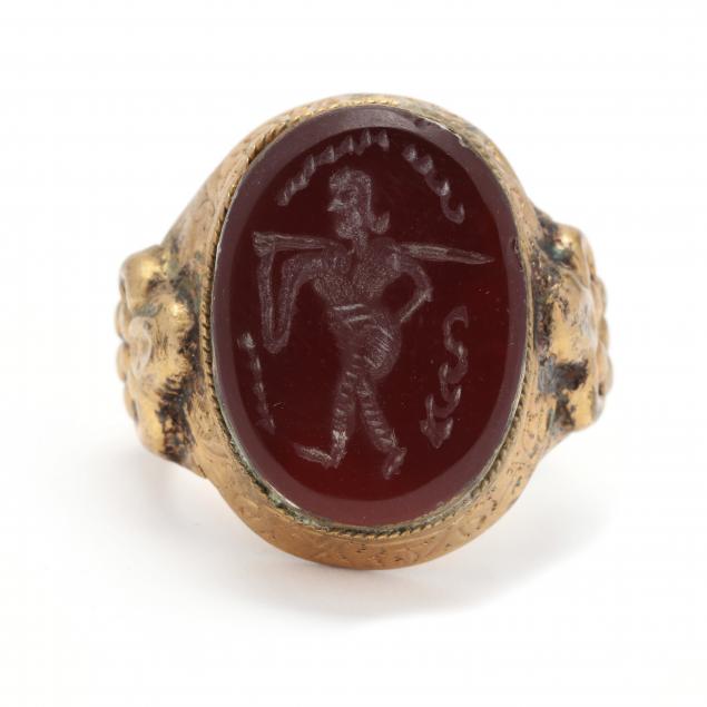 classical-style-gold-ring-with-sard-intaglio-of-striding-man