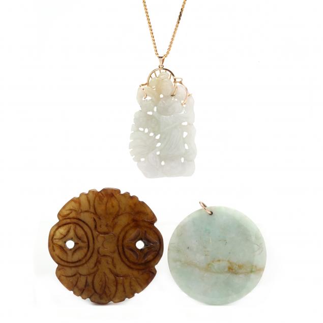 three-carved-hardstone-pendants