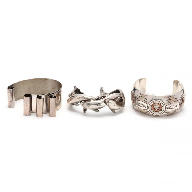 three-silver-cuff-bracelets