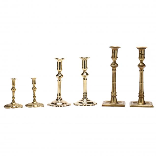 three-pairs-of-18th-century-queen-anne-brass-candlesticks