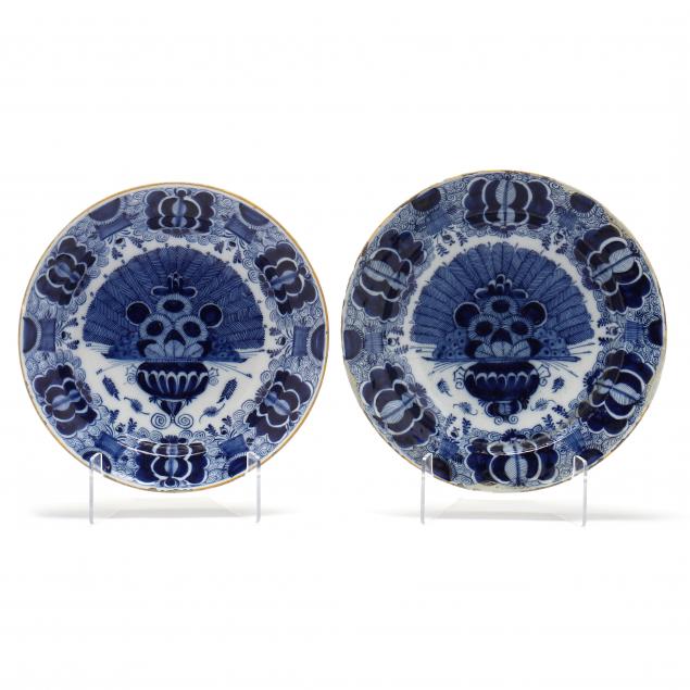 i-de-klauw-i-a-near-pair-of-dutch-delft-blue-and-white-deep-chargers