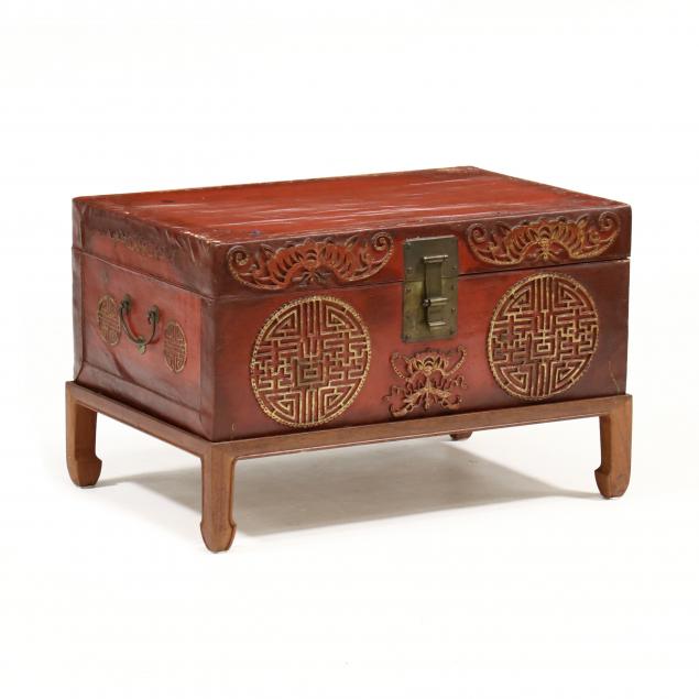 chinese-red-lacquered-pigskin-wedding-trunk-on-stand