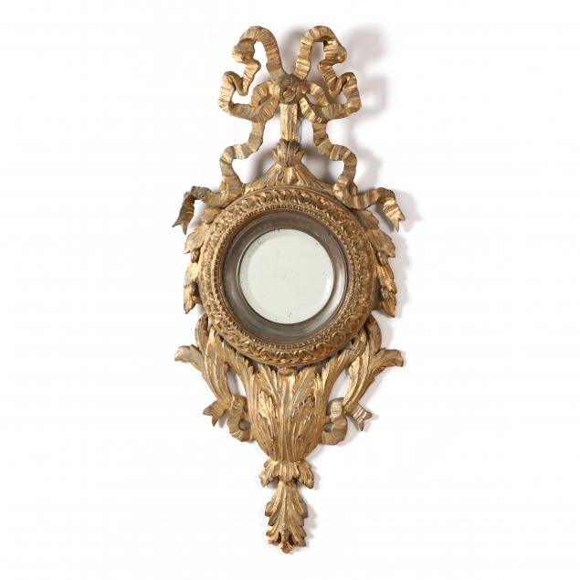 an-ornate-italian-giltwood-tondo-mirror