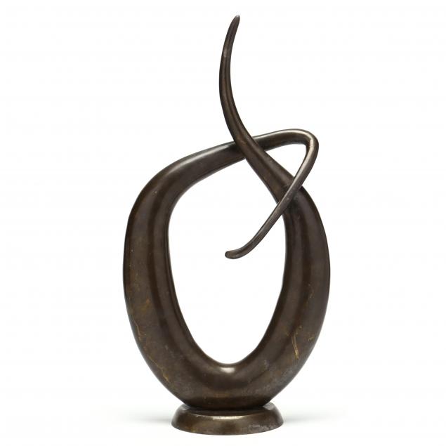 an-abstract-brass-sculpture