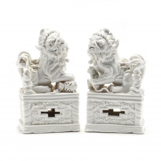 a-pair-of-blanc-de-chine-porcelain-foo-lions