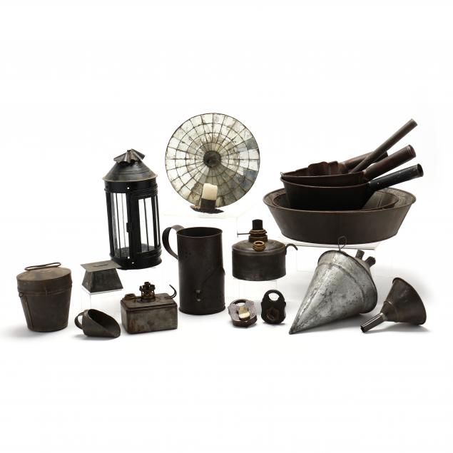 a-grouping-of-18-primitive-tinware-and-metal-accessories