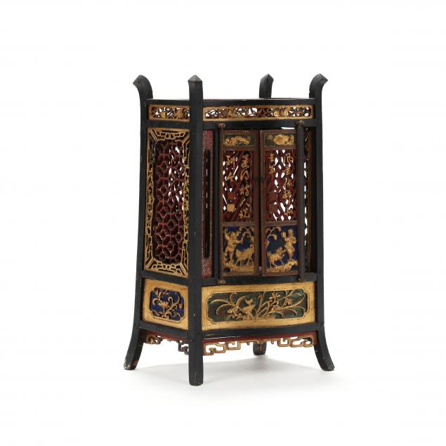 a-chinese-painted-and-gilded-carved-wood-table-cabinet