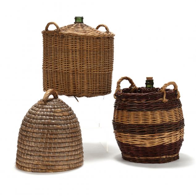 two-large-basket-covered-demijohns-and-a-bee-skep-basket