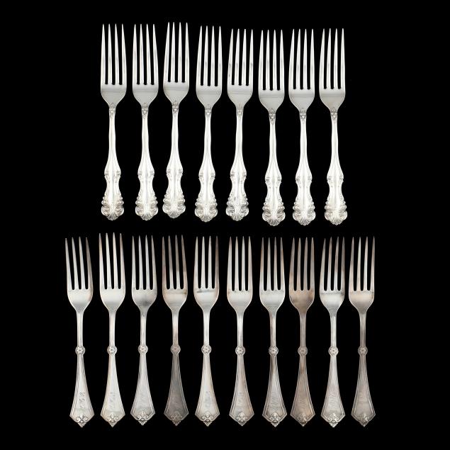 two-sets-of-sterling-silver-forks