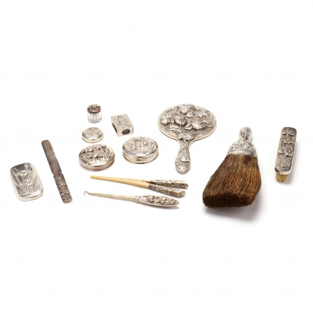 an-assembled-chinese-export-silver-dressing-set-with-iris-and-chrysanthemum-motifs