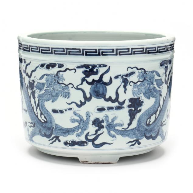 a-chinese-porcelain-blue-and-white-jardiniere-with-dragons