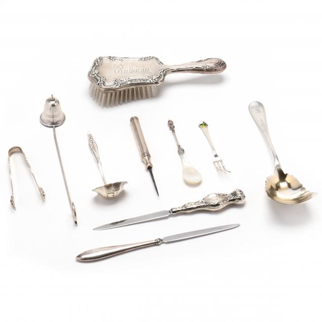 a-grouping-of-ten-sterling-silver-flatware-and-accessories