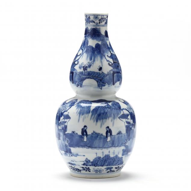 a-chinese-porcelain-blue-and-white-double-gourd-vase-with-landscape