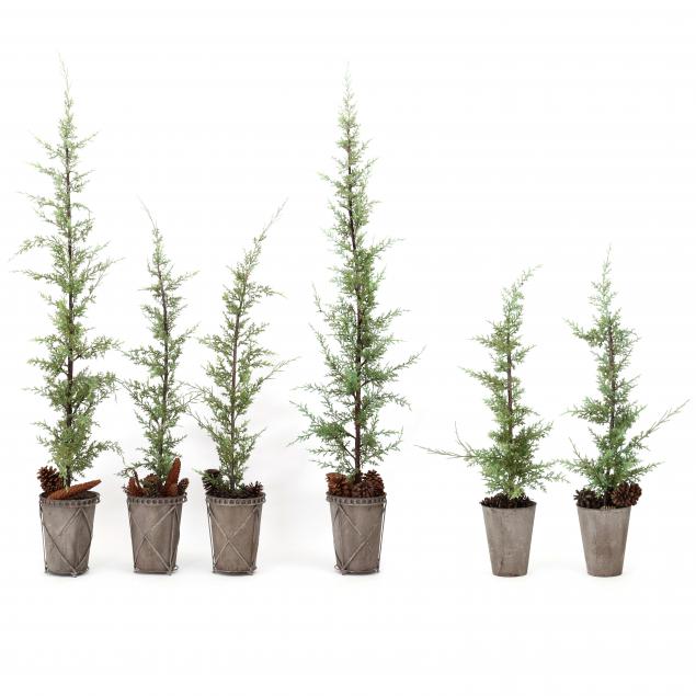 three-pairs-of-artificial-trees-in-jardinieres