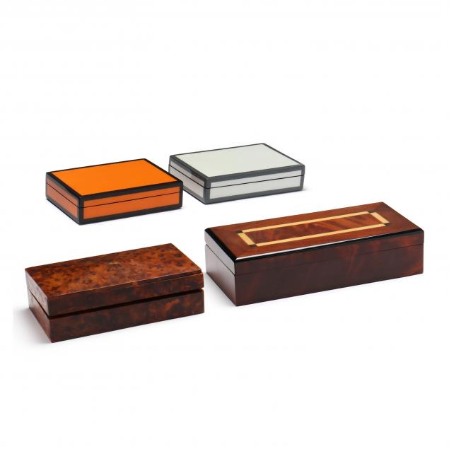 a-grouping-of-four-decorative-desk-boxes