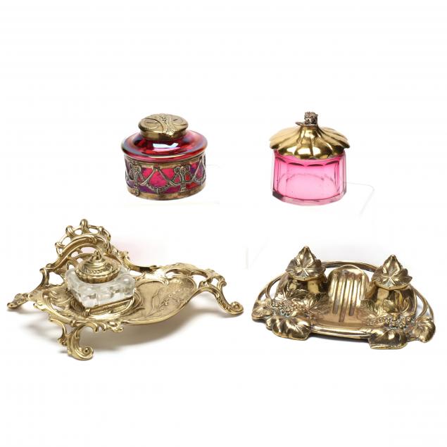 a-grouping-of-inkstands-and-desk-accessories