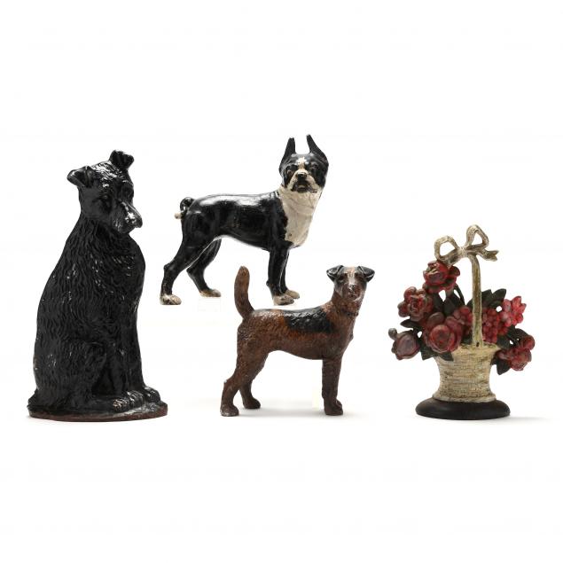 four-vintage-cast-iron-doorstops-including-three-terriers