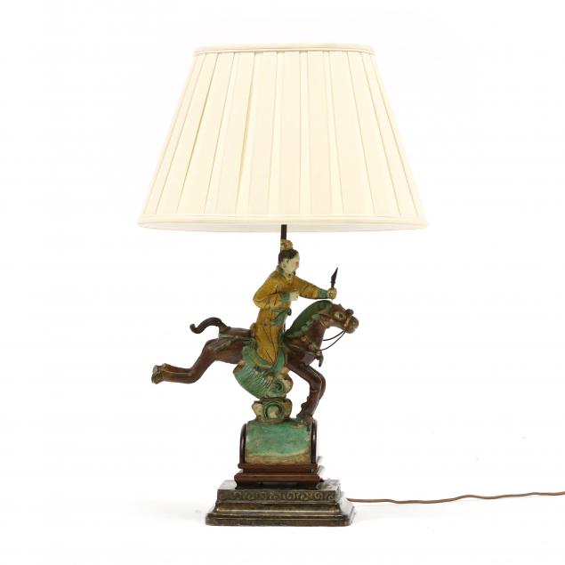a-chinese-ceramic-roof-tile-mounted-as-a-table-lamp