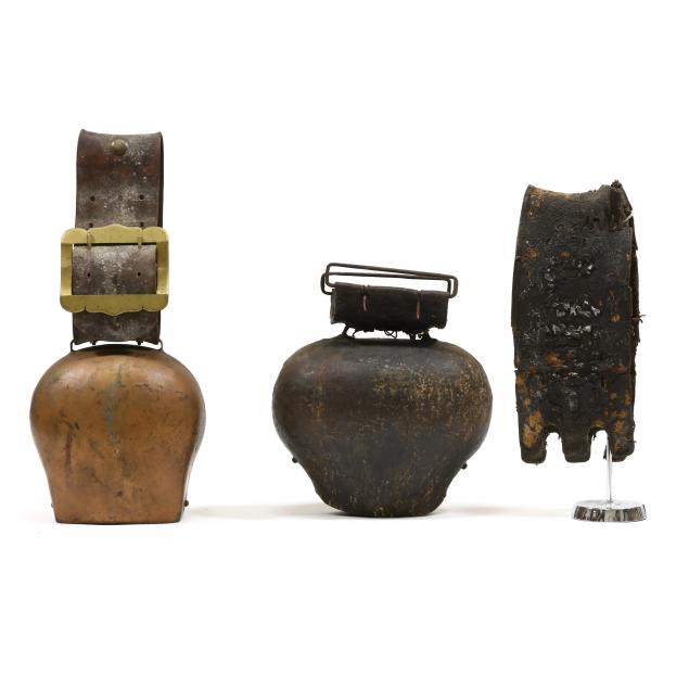 two-large-cow-bells-with-leather-collars