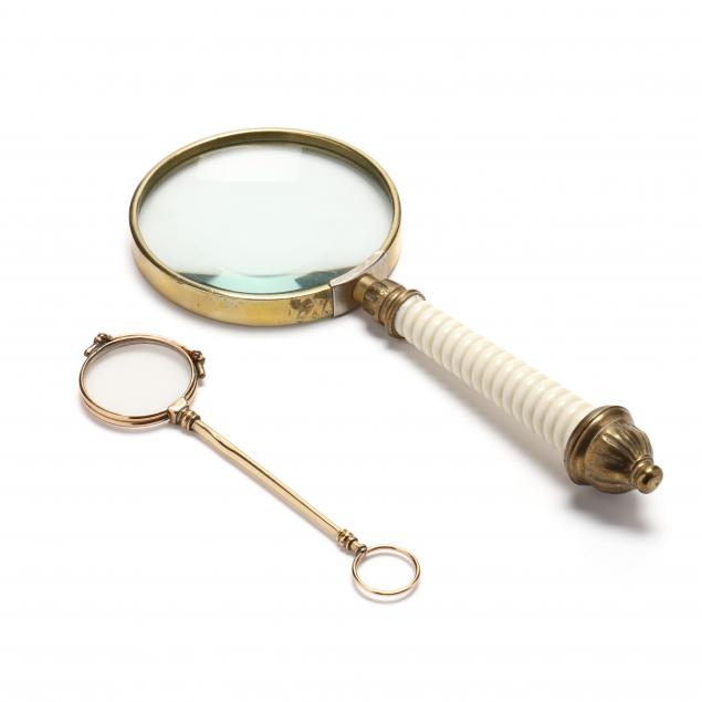 two-gilt-framed-magnification-instruments