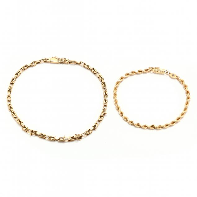 a-gold-bracelet-and-a-gold-ankle-bracelet