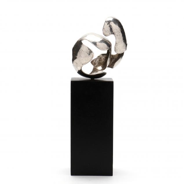 abstract-hammered-silver-sculpture